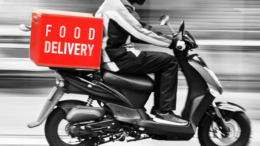 picture of a scooter delivery service in motion blur