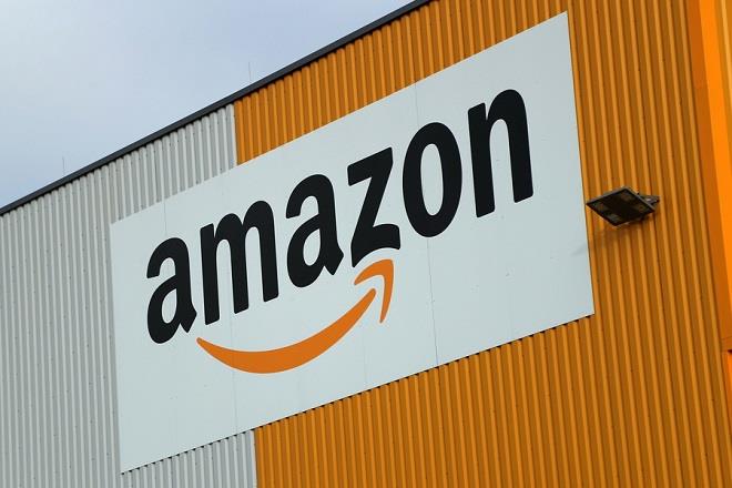 epa06898241 (FILE) - A general exterior view of the new Amazon Logistic and Fulfillment Center in Dortmund, Germany, 14 November 2017 (re-issued 19 July 2018). Reports on 19 July 2018 state Amazon crossed the 900 billion USD line on 18 July after its shares saw a rise of 0.8 per cent to a record 1,858.88 USD to become only the second company after Apple to be valued that high.  EPA/FRIEDEMANN VOGEL