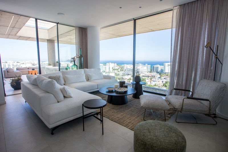 Eden Residences - Living room with sea view daytime (1)